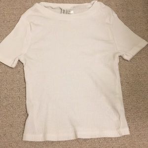 White ribbed divided shirt.